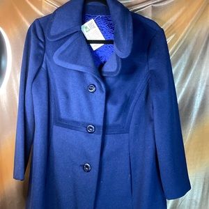 Vintage navy blue winter wool coat. Immaculate construction satin quilted lining